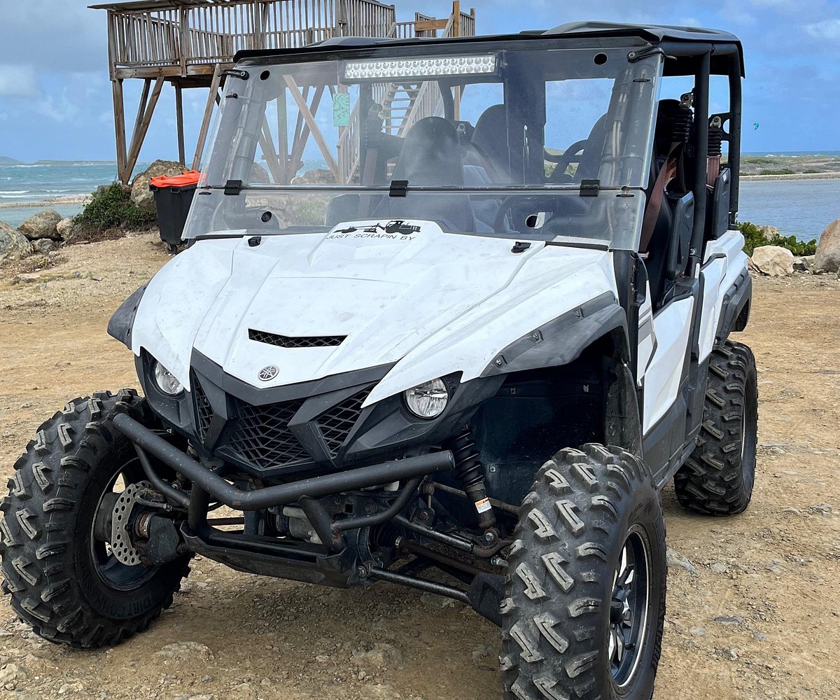 Illustrative four seat buggy beside the Caribbean coast